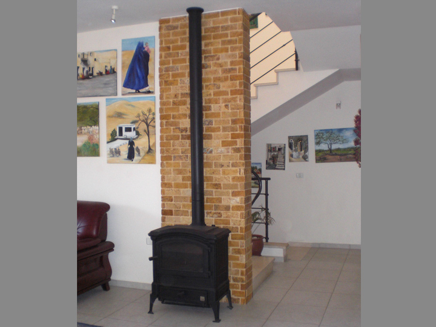 חיפוי אבן מאחורי האח